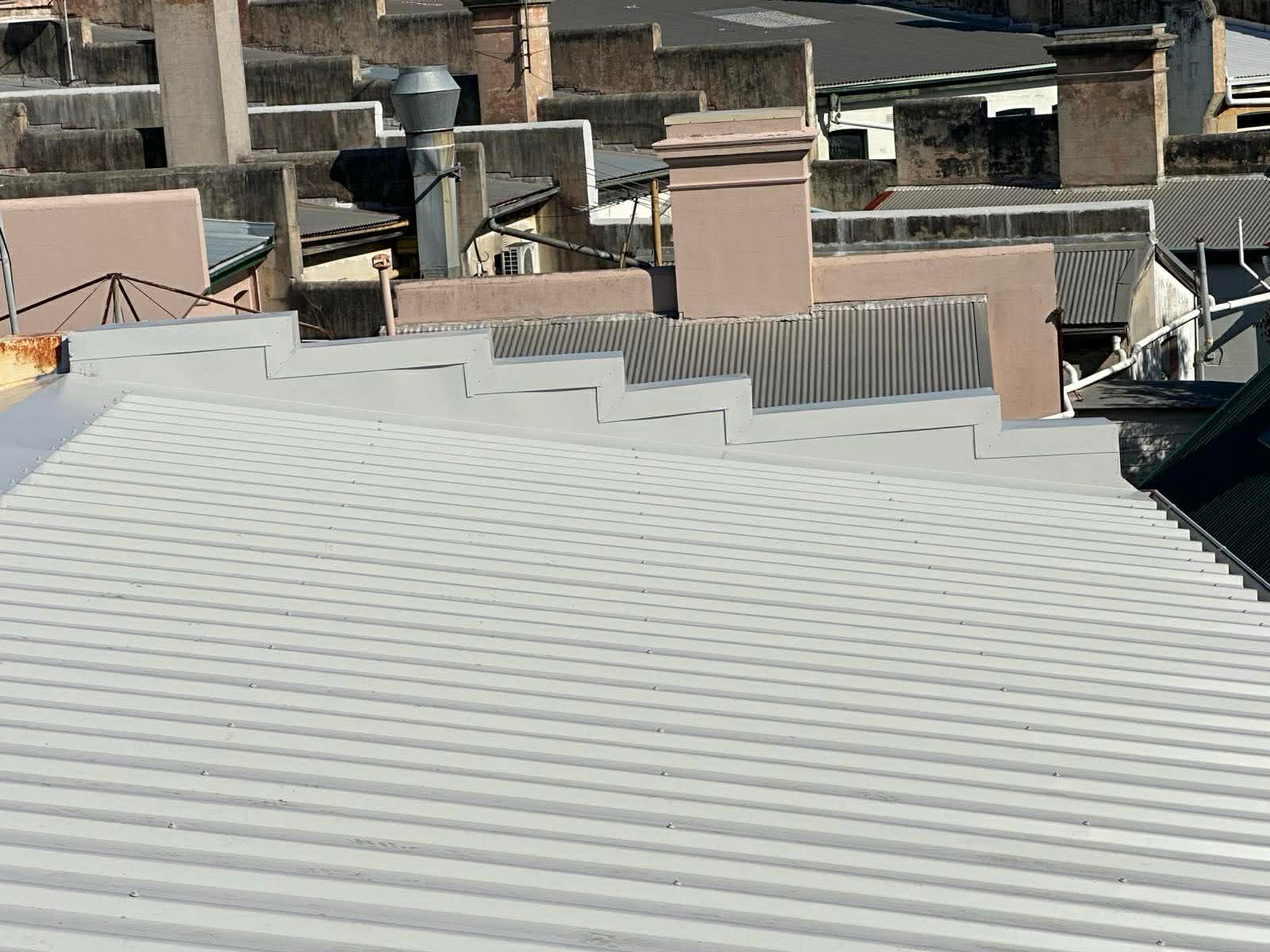 Grey Colorbond corrugated roof with whirlybird vents Sydney